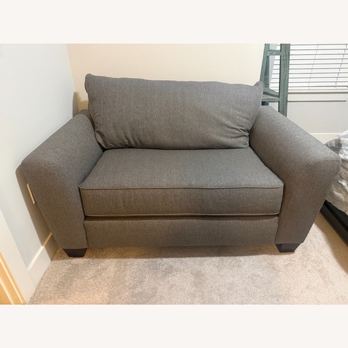 Used Rooms to Go Dark Gray Loveseat for sale on AptDeco