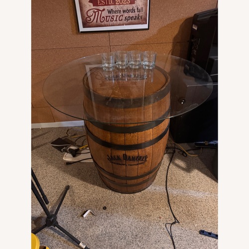 Used Jack Daniel's Whiskey Barrel Glass Top Table for sale on AptDeco