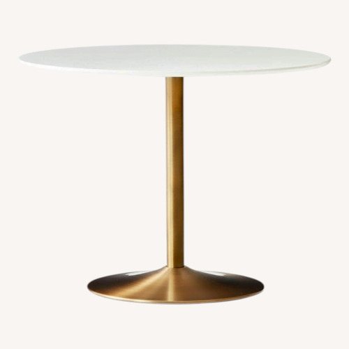 Used CB2 Odyssey Brass Dining Table for sale on AptDeco