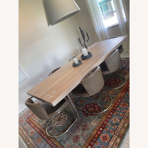 Used CB2 Cleo Dark Brown Leather Dining Chairs for sale on AptDeco