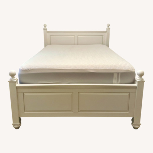 Used Solid Wood Panel Queen Bed for sale on AptDeco