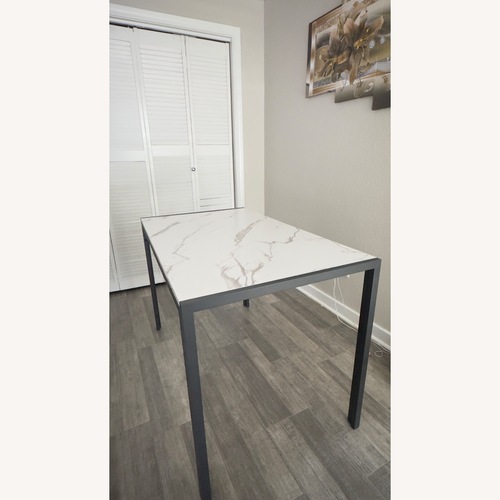 Used White Marble Dining Table for sale on AptDeco