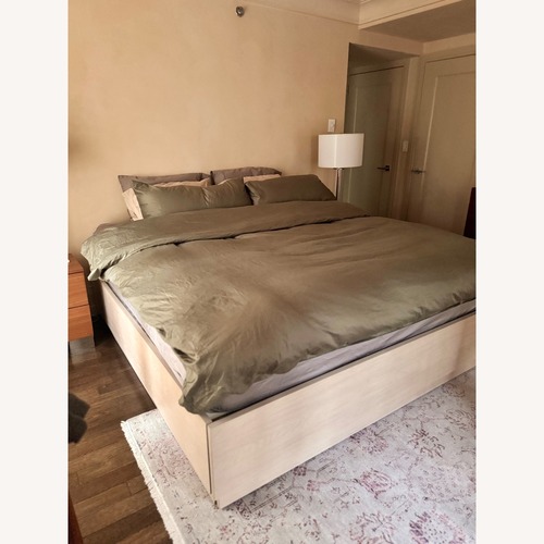 Used Crate & Barrel Batten Oak Storage Bed  for sale on AptDeco