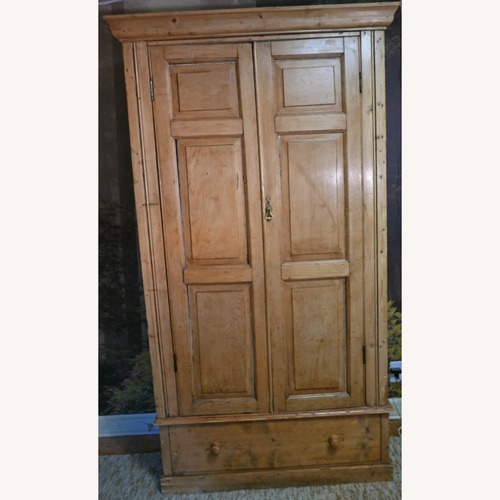 Used Vintage/Antique Natural Wood Armoire for sale on AptDeco