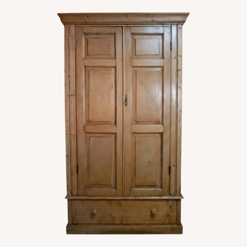 Used Vintage/Antique Natural Wood Armoire for sale on AptDeco