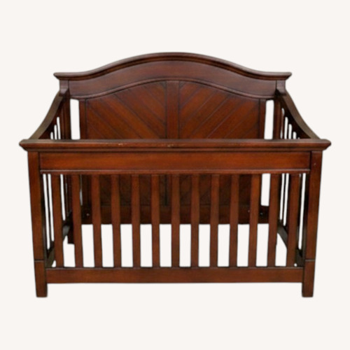 Used Light Brown Wood Crib for sale on AptDeco