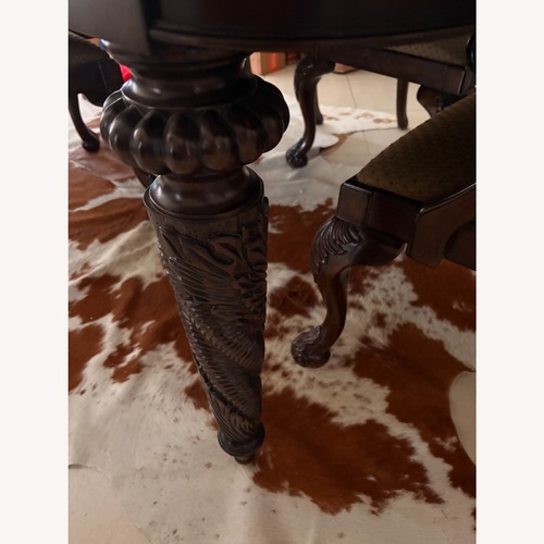 Used Dark Brown Wood Dining Set for sale on AptDeco