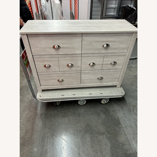 Used Wade Logan Bhure 6 Light Gray Wood Dresser for sale on AptDeco