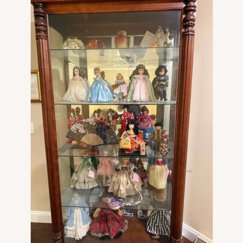 Used Howard Miller Lighted Curio Cabinet for sale on AptDeco