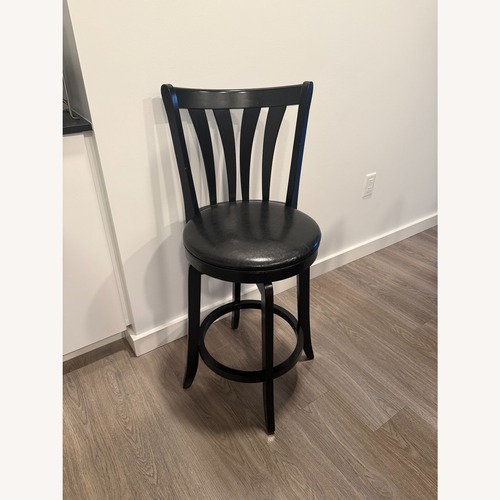 Used Swivel Counter Stools (Set of 2) for sale on AptDeco