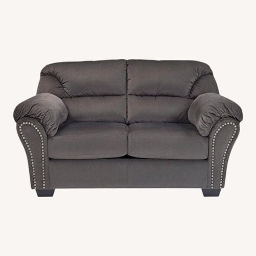 Used Ashley Furniture Kinlock Dark Brown Loveseat for sale on AptDeco