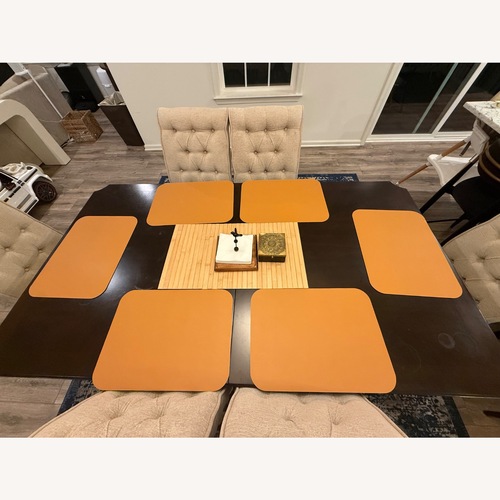 Used Raymour & Flanigan Dark Brown Wood Dining Table for sale on AptDeco