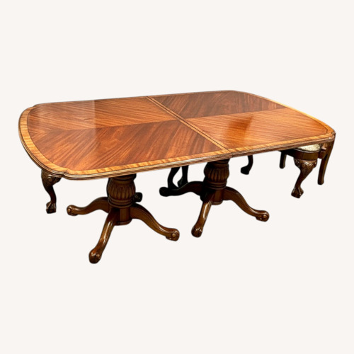 Used Johnson Brothers Chippendale Dining Table for sale on AptDeco
