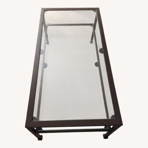 Used Ashley Furniture 2 Tiered Glass Coffee Table for sale on AptDeco