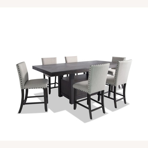 Used Ashley Furniture Dark Brown Wood Dining Set for sale on AptDeco