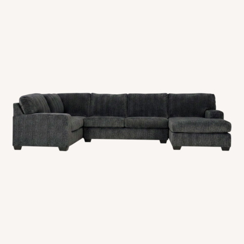 Used Ashley Furniture Black Hollyview Shadow Sectional for sale on AptDeco