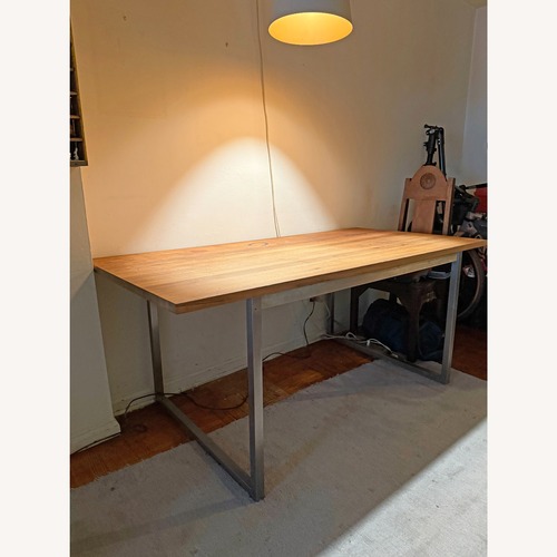 Used ABC Carpet and Home Dark Brown Wood Dining Table for sale on AptDeco