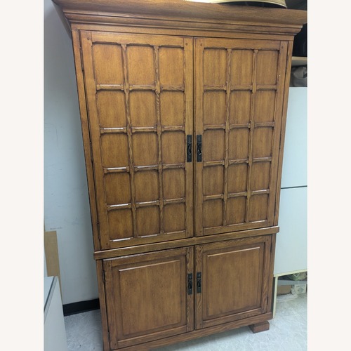 Used Dark Brown Armoire for sale on AptDeco