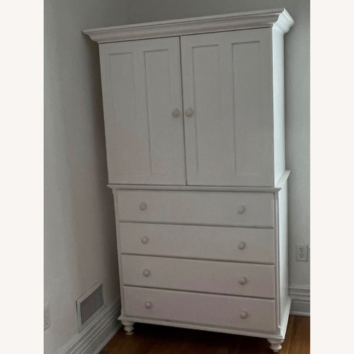 Used Crate & Barrel two piece armoire. for sale on AptDeco