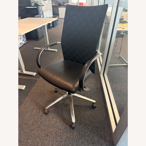 Used Adjustable Height Office Chair Woven Back  for sale on AptDeco