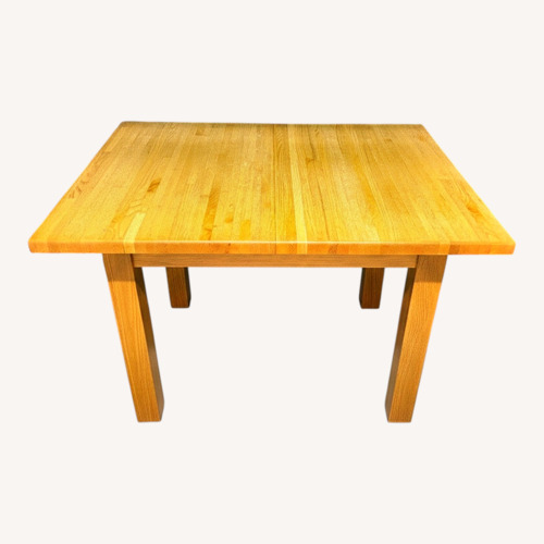 Used Natural Wood Dining Table for sale on AptDeco