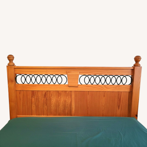 Used Solid Pine & Iron Winged Queen Bed for sale on AptDeco