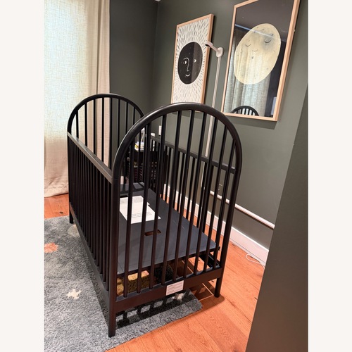 Used Crate & Barrel Leann Ford Black Wood Crib for sale on AptDeco