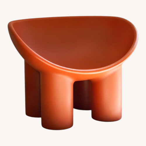 Used Orange Polyurethane Accent Chair for sale on AptDeco