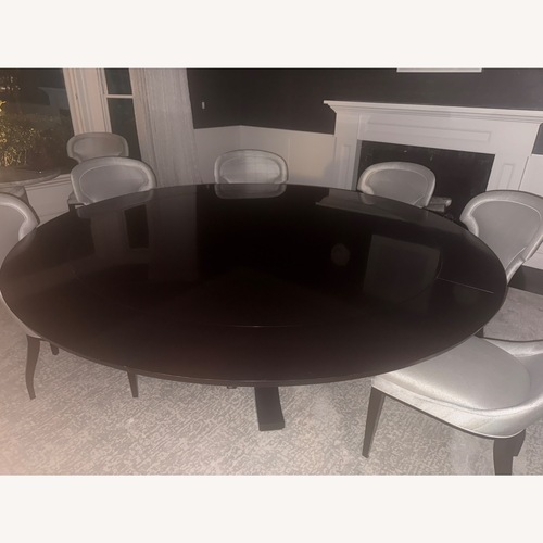 Used Mark Round Dining Table  for sale on AptDeco