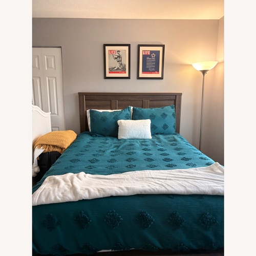 Used Ashley Furniture Dark Brown Wood Queen Bed for sale on AptDeco