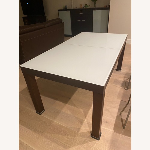 Used Dark Brown Wood and Glass Dining Set for sale on AptDeco