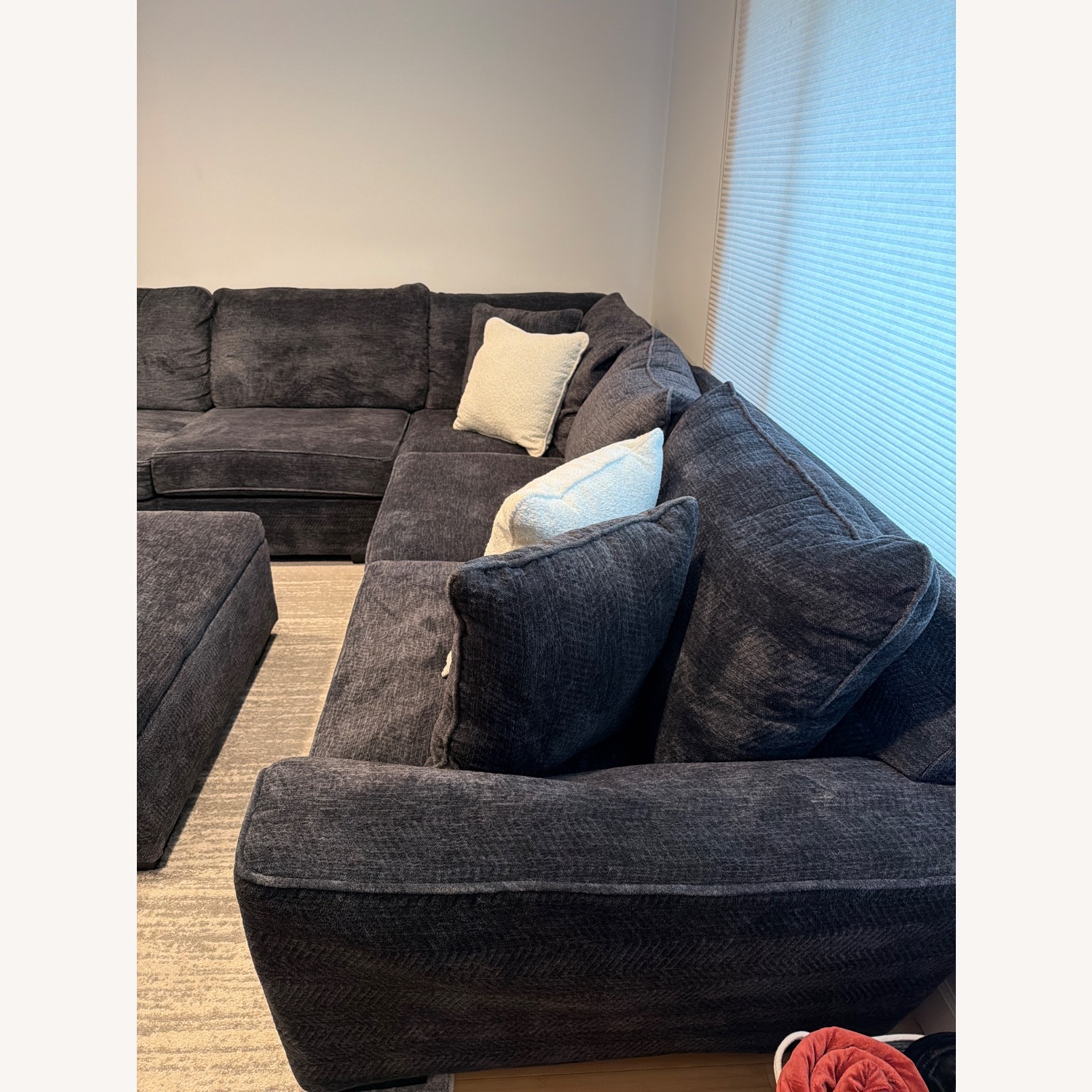 Living Spaces Dark Gray Sectional and Ottoman - image-3