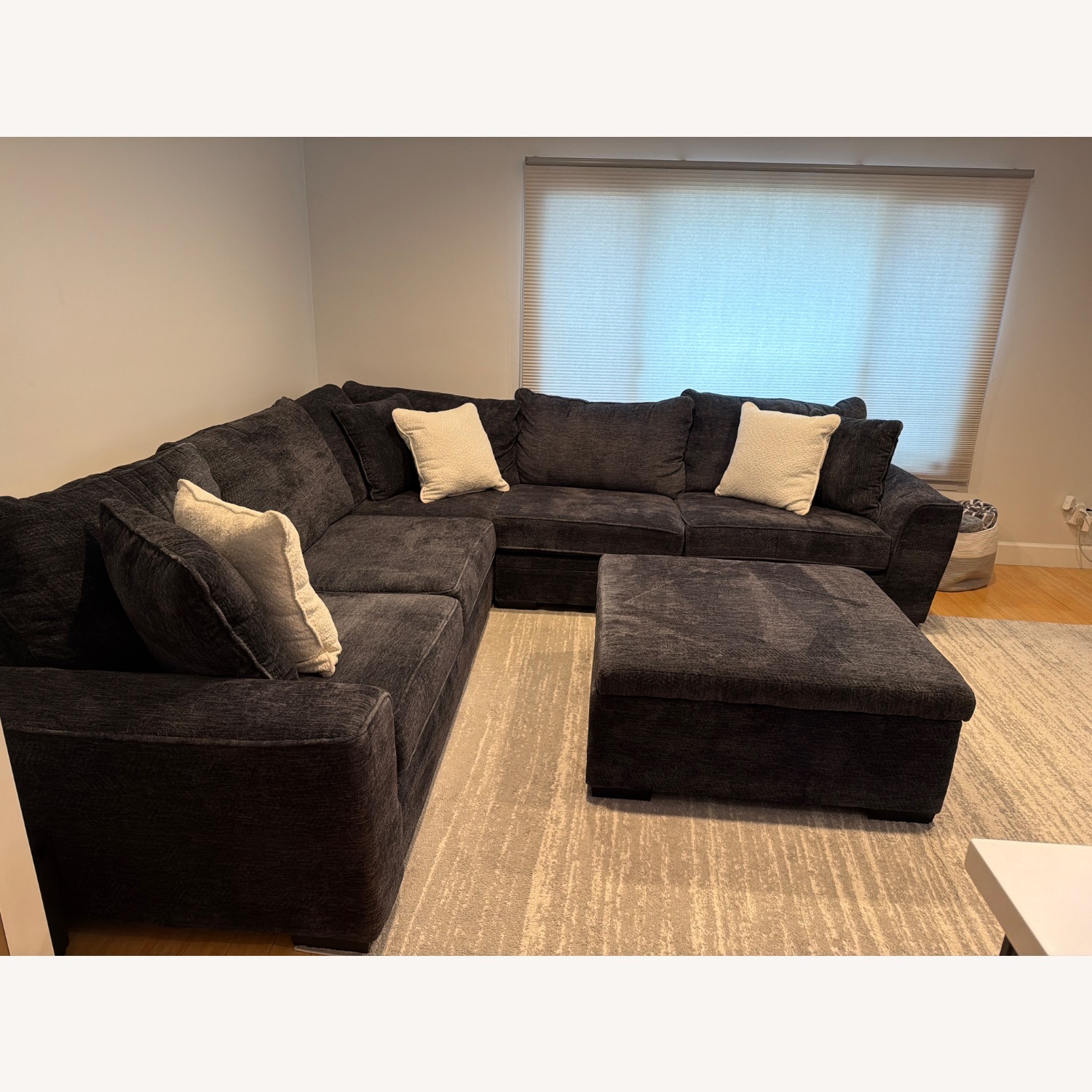 Living Spaces Dark Gray Sectional and Ottoman - image-4