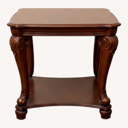 Used Ashley Furniture Dark Brown Coffee Table for sale on AptDeco
