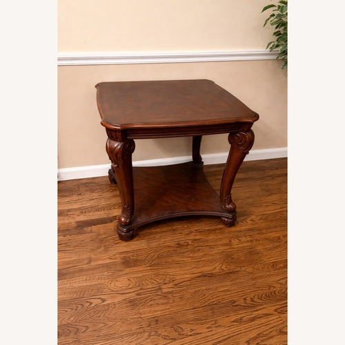 Used Ashley Furniture Dark Brown Coffee Table for sale on AptDeco