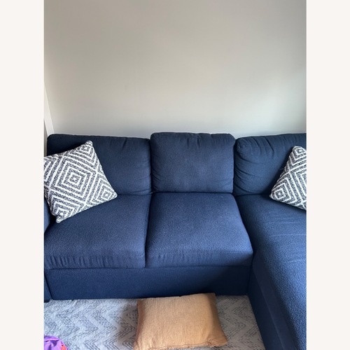 Used Bob's Discount Furniture Playday Pop-up Sleeper Chaise Sectional for sale on AptDeco