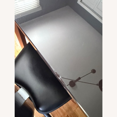 Used Calligaris Black Glass Dining Table for sale on AptDeco
