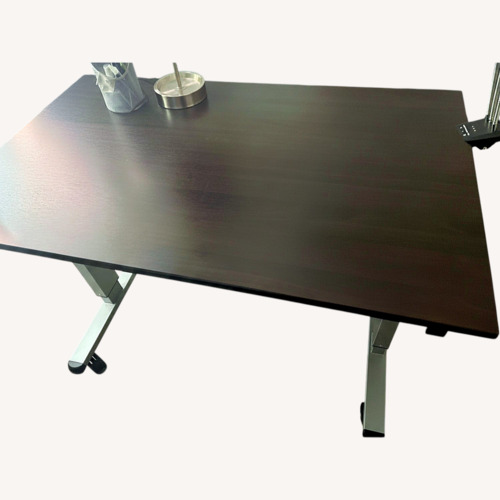 Used Dark Brown Wood Desk Stand Up w Crank for sale on AptDeco