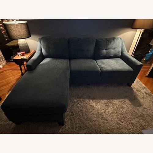 Used Blue Sleeper Sofa with Reversible Chaise for sale on AptDeco