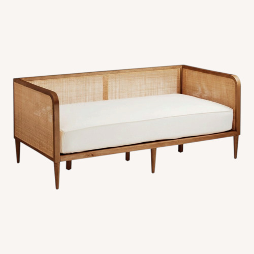 Used World Market Kira Rattan Cane Bed for sale on AptDeco