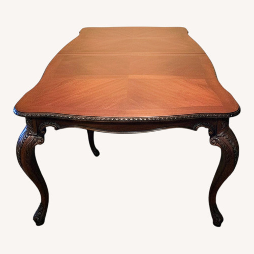 Used Vintage/Antique Dark Brown Dining Table for sale on AptDeco