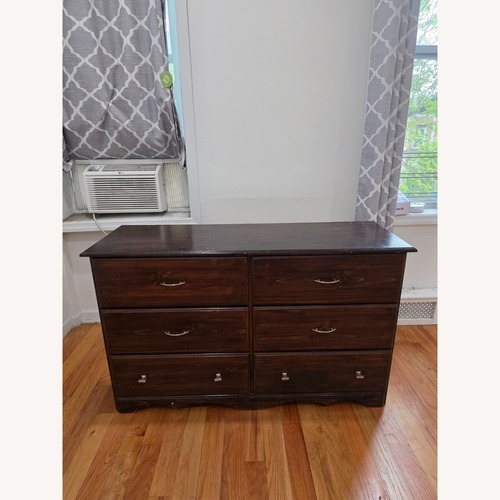 Used Dark Brown Wood Dresser for sale on AptDeco