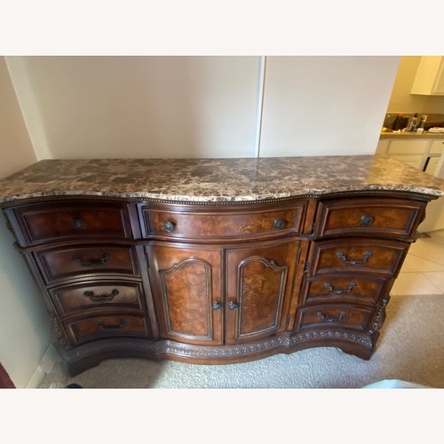 Used Ledelle Dark Brown Wood Dresser for sale on AptDeco