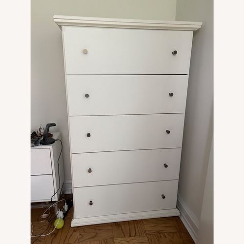 Used Raymour & Flanigan White Wood Armoire for sale on AptDeco