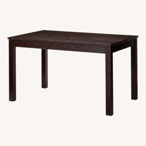 Used IKEA Extendable Dark Brown Wood Dining Table for sale on AptDeco