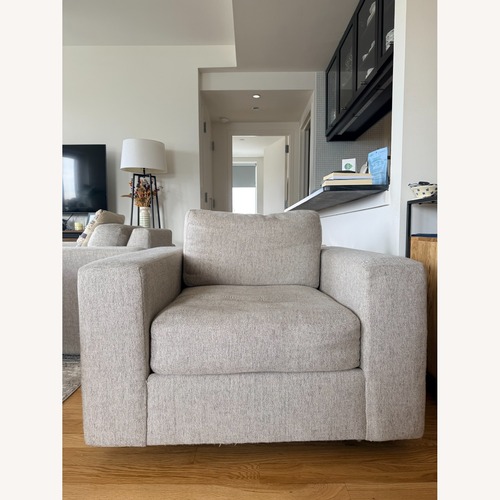 Used West Elm Light Gray Fabric Swivel Armchair for sale on AptDeco