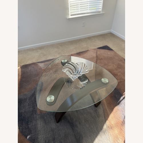 Used Dark Brown Glass Coffee Table for sale on AptDeco