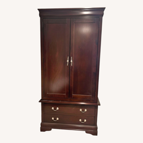 Used Dark Wooden Wardrobe for sale on AptDeco