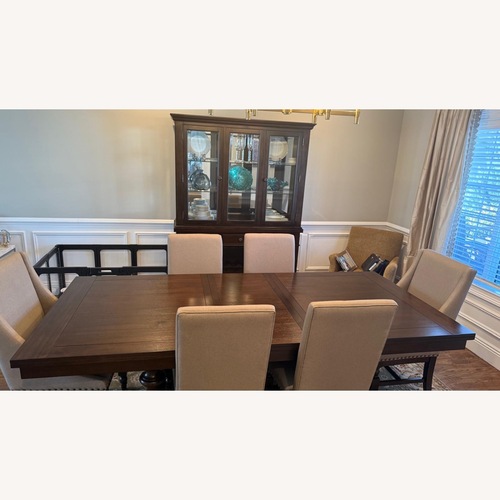 Used Raymour & Flanigan Dark Brown Wood Sideboard for sale on AptDeco