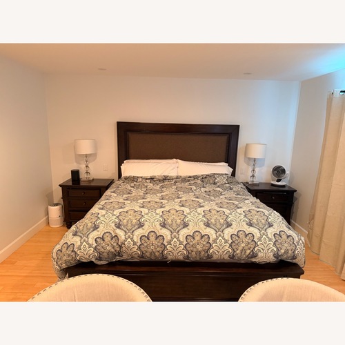 Used Ashley Furniture Dark Brown Wood King Bed for sale on AptDeco